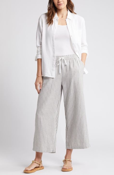 Breezy stripes adorn these lightweight linen-blend pants cut with flowy wide legs and topped with a comfortable elastic waist. 24 1/2" inseam; 25" leg opening; 11 1/2" front rise; 15 1/2" back rise (size Medium) Elastic/drawstring waist Front slant pockets; back welt pockets 55% linen, 45% rayon Machine wash, tumble dry Imported Striped Linen Pants Outfit, Wide Leg Linen Pants Outfit, Linen Pants Outfit Ideas, How To Style Linen Pants, Style Linen Pants, Linen Pants Style, Beige Linen Pants, Comfortable Summer Outfits, Pants Outfit Ideas