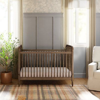 Liberty's fresh take on the antique spindle crib brings vintage elegance to the nursery. The classic silhouette is made bolder with a sturdy frame and thicker spindles. The versatile Liberty crib is the perfect centerpiece in any nursery. | Namesake Liberty 3-in-1 Convertible Spindle Crib Brown/Yellow, Wood | MDBC1034_97018843 | Wayfair Canada Spindle Crib, White Baby Cribs, Brown Crib, Convertible Cribs, 135 Pounds, Wood Crib, Spindle Design, Glider Rocker, Crib Toddler Bed