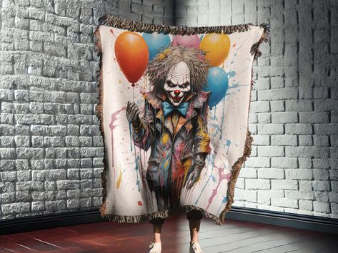 Creepy Clown Woven Blanket - Perfect for Halloween Decor & Cozy Chills! Transform your space into a spine-chilling carnival of horror with our Creepy Clown Woven Blanket! This hauntingly beautiful throw features an eerie clown design that's perfect for adding a touch of spooky charm to your Halloween decor. Whether you're snuggling up for a scary movie marathon or draping it over your couch to create a chilling atmosphere, this blanket is sure to send shivers down your spine. Why You'll Love It: This blanket isn't just for looks--its soft, woven fabric provides warmth and comfort, making it the perfect blend of spooky and snug. The detailed design captures the unsettling charm of classic clowns, making it a standout piece for any Halloween collection! WOVEN BLANKET DETAILS: - Design is wov Scary Movie Marathon, Clown Design, A Scary Movie, Blanket Halloween, Creepy Clown, Woven Throw Blanket, Scary Movie, Woven Blanket, Scary Movies