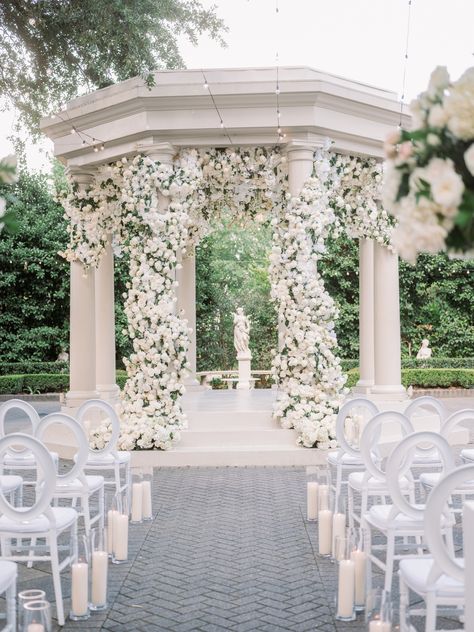 Embrace the Elegance: The Enchanted Gazebo at Elms Mansion 🌿✨ A picturesque canvas for your love story, where white blooms and lush greenery create a magical ceremony backdrop. Make your dream wedding a reality at this timeless venue. 💍 Wedding Gazebo Flowers, Gazebo Wedding Ceremony, Gazebo Wedding Decorations, Floral Wedding Ceremony, Wedding Pergola, White Gazebo, Wedding Gazebo, Gazebo Decorations, Weddings Small
