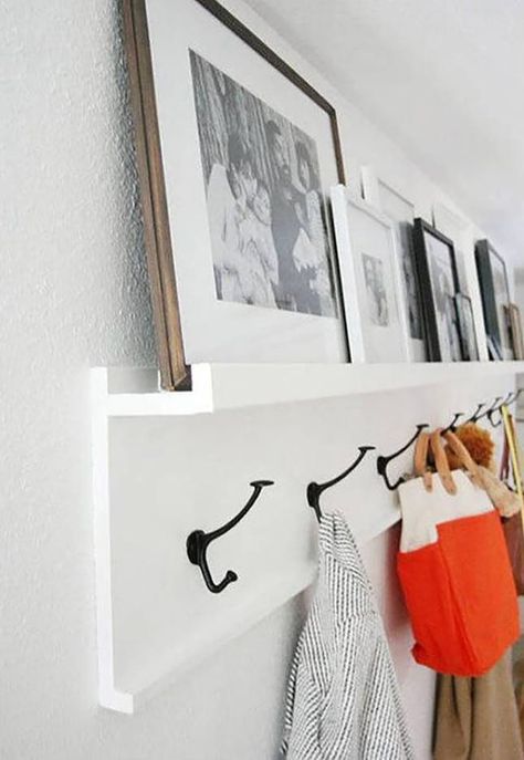 Hang your coats AND display your fave photos with this coat rack shelf. Build Your Own Wardrobe, Wall Mounted Wood Shelves, Entryway Coat Hooks, Garderobe Diy, Shelf Entryway, Rustic Coat Rack, Entryway Organizer, Coat Rack Shelf, Picture Ledge