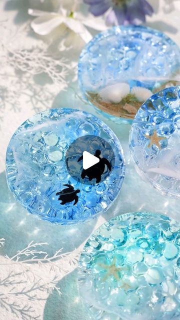 187K views · 6.6K likes | Let's Resin on Instagram: "🌊 Delighted to unveil the resin ocean ripple coasters. By using the deeper molds, we've expanded our creative horizons. It beautifully captures the layers of ocean water ripples and adds marine elements to achieve more vividness.  🛒 The main steps and resin supplies are listed in the video. Enter 𝐝𝐞𝐞𝐩𝐜𝐨𝐚𝐬𝐭𝐞𝐫𝐬 to get 20% off of the mold we used. Link in bio.   How do you like it? Feel free to leave a comment 💙 to let us know.  #letsresin #resinsupplies #resincoaster #resindiy #resincoasters #resinartideas #waterripples #epoxyresincoasters #coasterdecor #resincrafts #oceanart" Layers Of Ocean, Diy Resin Coasters, Diy Resin Mold, Amazing Resin, Diy Crafts Bookmarks, How To Make Resin, Art Kits For Kids, Resin Ocean, Diy Resin Projects