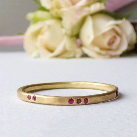 Are you interested in our ruby wedding band? With our fairtrade ruby wedding ring you need look no further. Red Stone Engagement Rings, Ruby Ring Simple, Gold And Ruby Ring, Ethical Rings, Ethical Wedding Rings, Colored Wedding Bands, Ruby Wedding Band, Ruby Wedding Rings, Ethical Wedding