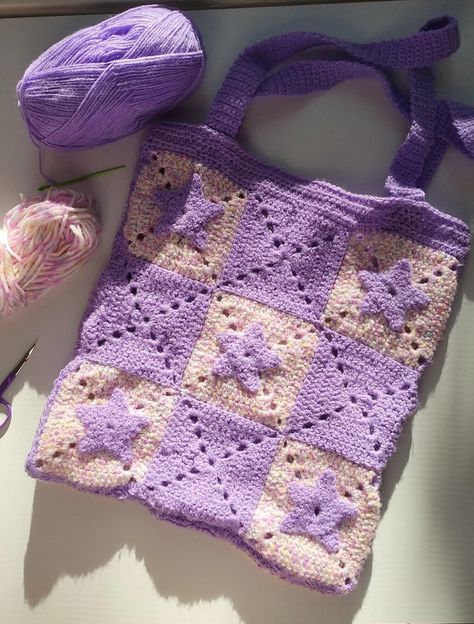 crocheted purple stars tote bag idea #cute #crochet #purple #yarn #grannysquares Purple Granny Square Bag, Pink And Purple Crochet Bag, Purple Bag Crochet, Crochet Olivia Rodrigo, Crochet Bag Purple, Crochet Purple Bag, Purple And Blue Crochet, Purple Crochet Bag, Pink And Purple Crochet