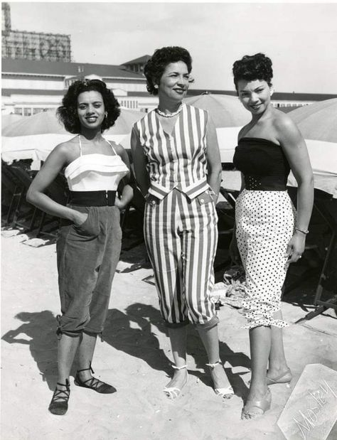 African-American women pose in Atlantic City. Chicken Bone Beach was the segregated section for African Americans on Atlantic City's beach area. Between 1900 and the early 1950s, African Americans were socially restricted to use the Missouri Avenue Beach Area. Since many vacationing Black families arrived with chicken-laden hampers, the strip became affectionately named "Chicken Bone Beach."African-American women pose in Atlantic City. Chicken Bone Beach was the segregated section for African Am African American 1950s Fashion Black Women, 1960s African American Fashion, Black Women In The 1950s, 30s Black Women, 1960s Fashion Black Women, 50s Fashion Black Women, 1950s Fashion Black Women, 1950s African American, 50s Family