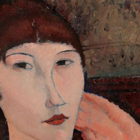 Modigliani Nobre on Instagram: "A woman with peachy skin and dark auburn hair is shown from her chest up sitting in a wooden chair in this vertical portrait painting. Her body is angled to our right, and her left arm, farther from us, rests on the back of the chair so the fingers of that hand rest alongside her left cheek. Her face is angled to our right but her dark eyes cut back to look at or toward us from the corners of her almond-shaped eyes. She has thin, gently arched brows, a long, sloping nose, and her burgundy-red lips are closed. Her features are outlined with delicate, dark gray or black lines. Bangs sweep across her forehead, and her hair looks like it might be pulled up and back. Her rust-brown garment has a square neckline, and a lighter strip of smoke gray and sky blue runs Paul Cézanne, Paintings Of Redheads, Modigliani Portraits, Modigliani Art, Amedeo Modigliani, Girls With Red Hair, Figurative Artists, Italian Painters, Paul Cezanne