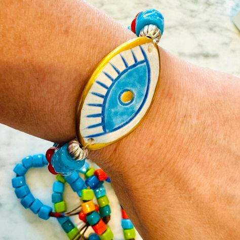 Ceramic Evil Eye Handmade Good Luck Blue Stretch Bracelet ( 1 Piece) New! One Of A Kind Unique Design! Hand Painted Evil Eye Charm Glass Beads Stretch Bracelet The Last Two Pictures Are For Style Reference Fast Shipping Smoke Free House Ceramic Evil Eye, Green Stone Bracelet, Jewelry Ceramic, Kate Spade Bracelet, Native American Bracelets, Hanging Beads, Style Reference, Adjustable Bangle Bracelet, Beach Bracelets