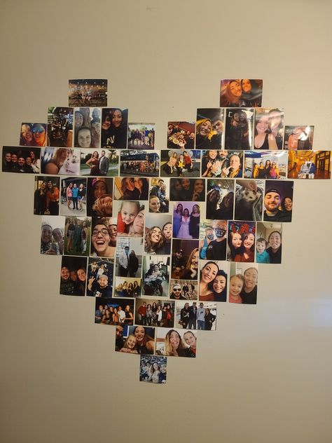 Many of the pictures are 4x6. I used command steps to stick everything to the wall. Photo Sticking Ideas On Wall, Picture Wall Ideas 4x6, Ways To Put Pictures On Wall, How To Make A Wall Collage, Heart With Pictures On Wall, Picture Heart Wall, Heart Picture Collage, Picture Heart, Gallery Wall Template