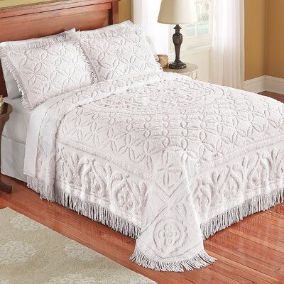 The beautiful wedding ring design of this plush chenille bedspread will instantly give your bed a touch of elegance and style. The intricate design includes fringe around the bottom. Size: Twin Bedspread, Color: Lavender | Red Barrel Studio® Pana Victoria Single Bedspread Polyester/Polyfill/Cotton/100% Cotton in Indigo, Size Twin Bedspread | Wayfair | Home Decor Twin Bedspreads, Queen Bedspread, Red Home Decor, Chenille Bedspread, Trellis Design, White Floor Lamp, Collections Etc, Mattress Sets, Bedding Stores