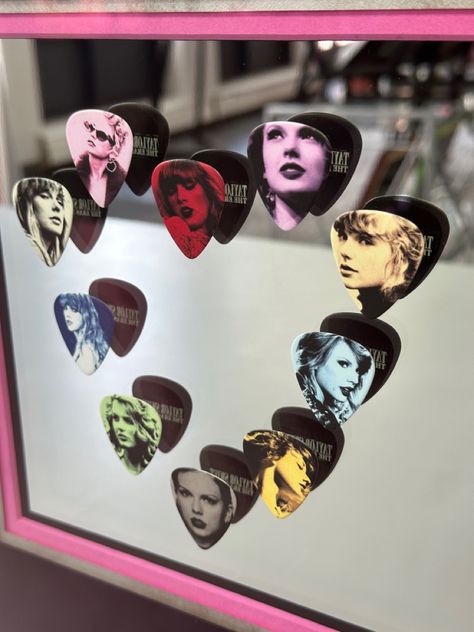 🎤 Calling all Swifties! Check out these Taylor Swift Eras Tour guitar picks we recently framed using a glitter frame, museum glass, three acid-free mats (one suede) and a mirrored background so the picks can be seen from both sides! For sale now! #art #denver #colorado #pictureframing #customframing #5280customframing #taylorswift #erastour #swifties Taylor Swift Guitar Pick, Eras Tour Guitar, Taylor Swift Guitar, Glitter Frame, Taylor Swift Eras Tour, Taylor Swift Eras, Framing Photography, Guitar Picks, Denver Colorado