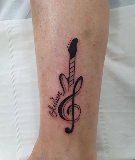 Bass Note Tattoo, Elephant With Music Notes Tattoo, Tumblr, I Love Music Tattoo Ideas, Heart Guitar Tattoo, Music Note Spine Tattoo, Music Note Guitar Tattoo, Ankle Music Tattoo, Guitar Music Note Tattoo
