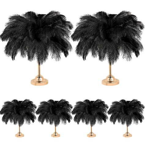 PRICES MAY VARY. Meet Using Needs: you will receive 80 pieces of ostrich feathers bulk in black color about 14-16 inches/ 35-40 cm, sufficient quantity and large size can meet your decorating and crafting needs in daily life Apply for: decorative feathers are nice for many occasions, such as themed weddings, table centerpieces, parties, cake tops, masquerade party decorations, family gatherings, festivals, photography, concerts, stages Natural Ostrich Feathers Adopted: feather trims are made of Gatsby Table Centerpieces, Masquerade Seating Chart, 20s Themed Party Decorations, 50th Birthday Party Table Centerpieces, Gold And Black New Years Party, Black And Silver Table Centerpieces, 60th Masquerade Birthday Party, John Wick Theme Party, Centerpieces For Male Party