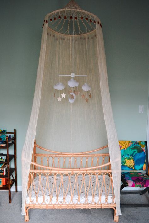 Jute rattan crib from Valentine and Co. Stars and Moon mobile from Firefly in Love on Etsy. Canopy from World Market. Chair from Anthropologie (can’t link because they don’t make this print anymore). Crib Canopy Diy, Diy Crib Canopy, Rattan Crib, World Market Chair, Baby Crib Canopy, Unique Cribs, Moses Basket Bassinet, Canopy And Stars, Moon Mobile