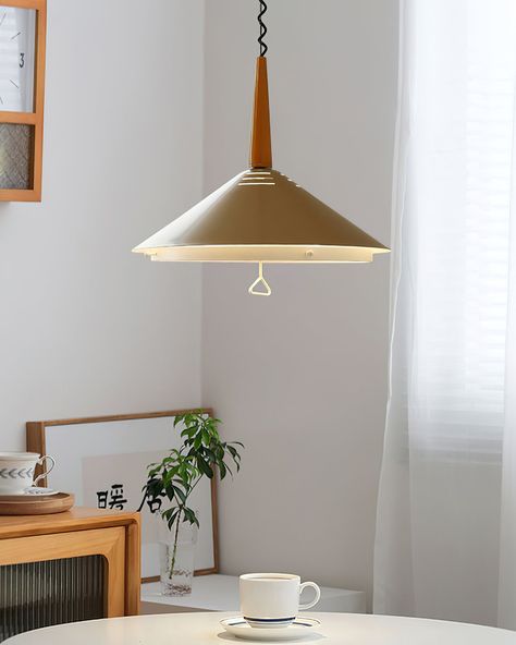 SUMMARY 
 This Acking Pendant Light is the perfect blend of vintage and modern styles. Its multi-layered trumpet-shaped design provides direct and indirect lighting, perfect for creating a warm and cozy atmosphere in your dining area. The low-hanging installation avoids unpleasant glare. 
 Note: Due to the narrow width of this wall lamp, it is not compatible with the standard American JBOX junction box. This lamp requires a specially sized junction box to ensure a proper fit; otherwise, gaps may Wabi Sabi, Wabi Sabi Style, Indirect Lighting, Black Shade, Color Orange, Pendant Lamp, Orange Black, Wall Lamp, Pendant Light