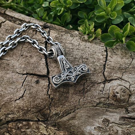 Mjolnir pendant ★Material: High Quality Solid 960 Sterling Silver★ Weight: approx 15 grams ( 0.52 oz) Height: 30 mm (1,18 inches) Two-sided Mjolnir Pendant Introducing the Mjolnir Pendant, a striking piece of Viking jewelry that embodies the power and might of Thor, the Norse god of thunder. This pendant, also known as the Thor Hammer Pendant, showcases the iconic symbol of Mjolnir, Thor's legendary hammer, and pays homage to the renowned Mammen style of Viking art. Crafted with meticulo... Thor, Vikings, Mammen Style, Mjolnir Pendant, God Of Thunder, Thor Hammer, Viking Art, Thors Hammer, Viking Jewelry