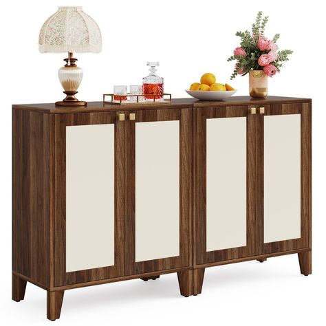 Looking for a rustic storage buffet for your home? Check out our kitchen sideboard. With tapered legs and cream-colored panels, all crowned with a walnut finish, it adds a splash of mid-century modern flair. This dining room cabinet easily complements diverse home decor styles. The wood sideboard buffet cabinet features a spacious interior and a large tabletop, providing plenty of space for your items. Kitchen Buffet Table, Cabinet Coffee Bar, Credenza Storage, Storage Buffet, Coffee Bar Cabinet, Sideboard Kitchen, Dining Room Cabinet, Entryway Cabinet, Wood Credenza