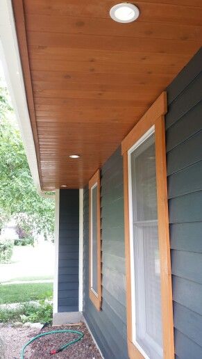 Cedar tongue and groove under the overhang. Wood Eaves Exterior, Cedar Exterior Trim, Wood Trim Around Windows Exterior, Cedar Trimmed Windows Exterior, Wood Exterior Window Trim, Wood Framed Windows Exterior, Tongue And Groove Soffit, Soffit Colors Exterior, Cedar Window Trim Exterior