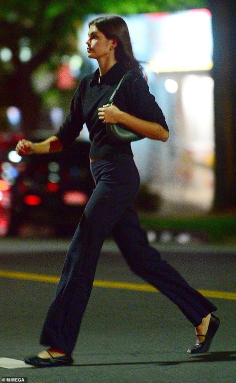 Low-key Kaia Gerber flashes a hint of her tummy in a cropped T-shirt as she leaves a restaurant in Hollywood | Daily Mail Online Tumblr, Kaia Gerber Outfits, Kaia Gerber Street Style, Hollywood Restaurants, Black Tights Outfit, Kaia Gerber Style, Tights Outfits, Minimalistic Outfits, Polo Shirt Outfits