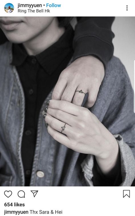 Would you get a wedding ring tattoo? We're sharing the pros and cons of wedding rings tattoo on our blog! Click to read and see more inspo. #ringtattoo #weddingringtattoo #wedding tattoo Wedding Ring Tattoo Ideas Couple Fingers, Tattoo Wedding Rings For Women Simple, Ring Finger Tattoo Couple Marriage, Engagement Ring Tattoos, Tattoos On Ring Finger, Wedding Band Tattoo For Her, Finger Ring Tattoo, Marriage Tattoos Ring Finger, Marriage Ring Tattoos