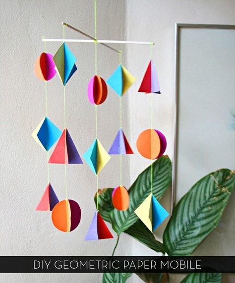 I looooooove mobiles. Love 'em. I love the energy they bring into a space, the visual interest, and the fact that they're not too terribly difficult to make yourself. And this DIY paper version? Easy peasy!     #diy Mobiles For Kids, Mobile Craft, Make A Mobile, Origami Mobile, Paper Mobile, Diy Mobile, Diy Bricolage, Diy Baby, Cool Diy Projects