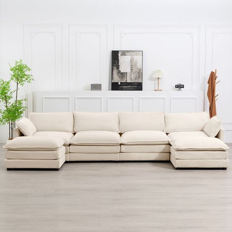 The sectional sofa is a type of furniture that combines the design and comfort of a sectional sofa with the texture and durability of corduroy fabric,consists of two or more connected seating modules, such as a sofa, loveseat, ottomans, which can be… Sofa Sectionals In Living Room, White Couch Living Room, Apartment Sofas, Beige Couch, Sofa With Ottoman, Room Couches, Fabric Sectional Sofas, Sectional With Ottoman, Modern Sofa Sectional