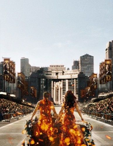 I love this scene as you compare it to the Tribute Parade from the first movie.. so good! Hunger Games Wallpaper, Tribute Von Panem, Hunger Games Movies, I Volunteer As Tribute, Hunger Games Fandom, Katniss And Peeta, Hunger Games 3, Hunger Games Series, Peeta Mellark