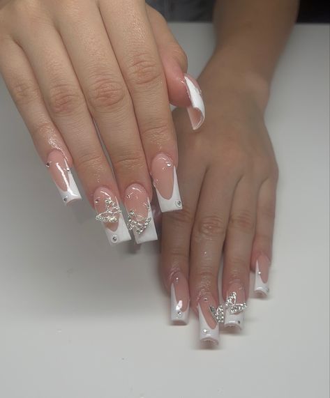 Medium nails White And Silver Butterfly Nails, White French Tip Nails With Butterfly Charm, White French Butterfly Nails, Short Square Acrylic Nails Butterfly, White Square Acrylic Nails Medium, French Tip With Butterfly Charm, Graduation Nails Medium, Cinderella Nail Designs, Wedding Nails Butterfly