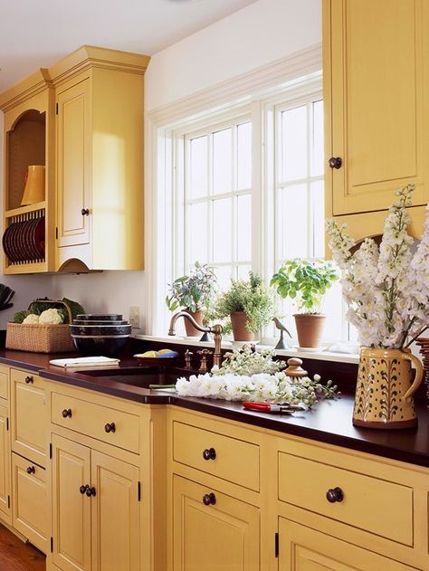 Interesting color. Primitive Kitchen, Yellow Kitchen Cabinets, Black Cottage, Kitchen Yellow, Yellow Cabinets, Ideas Casa, Yellow Kitchen, Kitchen Cabinet Colors, French Cottage