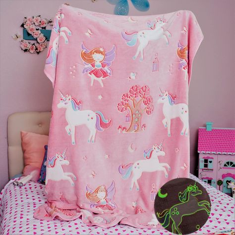 PRICES MAY VARY. 🦄 LOOKS ADORABLE DAY & NIGHT: This precious pink blanket is like a storybook come to life with a whimsical design featuring beautiful unicorns, sweet fairies, and enchanted tree houses. This unicorn blanket for girls has several cute colors to coordinate with any room décor by day, and a whole charming scene that glows at night transforming the room into a wonderland! ⭐ GLOWS BRIGHTER & LONGER: While many glow throw blankets require hours of bright light, then dimly glow for ju Dark Unicorn, Unicorn Blanket, Fuzzy Blanket, Beautiful Unicorn, Unicorn Pattern, Unicorn Toys, Unicorn Design, Pink Rainbow, Unicorn Gifts