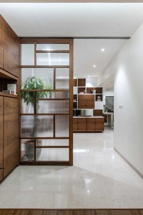 Partition wall ideas for your home: Types and cost of latest partition wall designs Modern Partion Design Interiors, Wooden Partition Design, Glass Partition Designs, Modern Partition, Modern Partition Walls, Room Partition Wall, Wall Partition Design, Glass Partition Wall, Partition Door