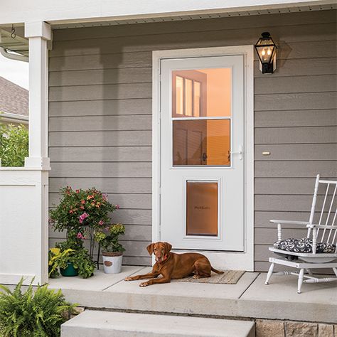 Let your large pet in and keep unwanted critters out with our built-in pet door. These half screen doors combine function and style, letting the light in while letting your dog in and out! The traditional highview design gives the bottom of the door enhanced durability and is ​the largest pet door we offer. Door height 81" Built-in pet door has a 14-in x 23-in flap opening For pets up to 220 lbs. Color matched hardware included Inside pet door security panel keeps intruders out Traditional half- Storm Doors, Deck Door, Large Dog Door, Larson Storm Doors, Glass Storm Doors, Pet Doors, Door Images, Wood Core, Retractable Screen