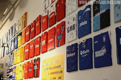 Football Jersey Display Ideas, Sports Office Decor, Sports Jersey Display, Race Bib Display, Sports Memorabilia Display, Old Football Shirts, Football Museum, Soccer Room, Sports Man Cave