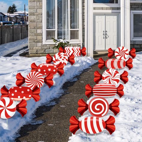 PRICES MAY VARY. Package Information: you can receive 12 pieces candy Christmas decorations in 12 different Christmas styles, the package included 24 pieces plastic stakes, enough styles and quantity to support your Christmas party decoration needs or the demands of sharing with neighbors Suitable Size: Christmas outdoor lawn signs measure about 14.17 x 5.12 inches, and the stake is approximately 13.8 inches length, large and noticeable enough to attracting the attention of passers-by and your n Candy Cane Yard Decor, Candy Cane Backdrop, Elegant Christmas Party Decor, Walkway Decor, Candy Garden, Christmas Styles, Outdoor Christmas Decorations Yard, 2024 Christmas, Arm Work
