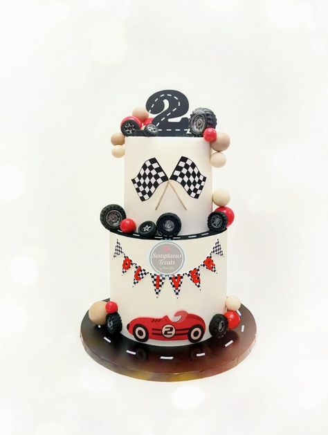 Racing Theme Cake #racing #racingcar  #cartheme #carthemecake #2ndbirthday #kidsbirthday #customcakes #sumptuoustreats #torontocakedecorator #cakes #torontocakes   www.sumptuoustreats.com Cupcakes Race Car, Two Fast Birthday Cupcakes, Race Theme Cake, Race Car Cake Pops, Car Race Cake, Racing Theme Cake, Race Car Birthday Cake, Racing Car Cake, Cars Cake Pops