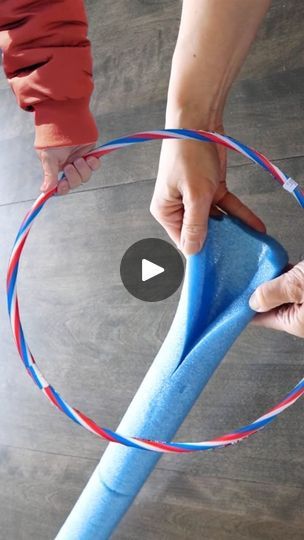 Dollar Store Pool Noodle Hula Hoop Hack | Stick a hula hoop into a pool noodle for this brilliant front porch idea! | By DIY with Hometalk | Grab a pool noodle and a hula
hoop for this front porch decoration. I'm going to use a
utility knife to slice the pool noodle vertically. This is
going to allow me to open up the pool noodle and slip it
around the hula hoop. I'm going to need about one and a
half noodles to cover this hula hoop. Now I'm going to grab
some duct tape and just secure the pieces together. Since this
is bright blue, I don't want it to show through my greenery. So
I'm going to grab some burlap ribbon and just wrap it around
the pool noodle. I can use a bit of hot glue as I go but
this should hold up pretty well. Now that this is all
covered in burlap, I've got these little What To Do With Pool Noodles Ideas, Diy Hula Hoop Canopy, Pool Noodle Ring Toss, Halloween Crafts With Pool Noodles, Hula Hoop Diy Projects, Balloon Arch With Pool Noodles, Pool Noodle Fireworks, Pool Noodle Wedding Arch, Pool Noodle Rockets