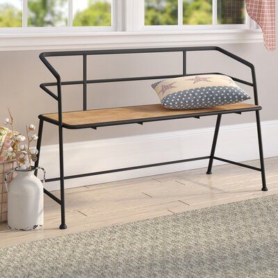 A brown rectangular industrial bench that is a perfect option for anyone who is in need of functionality and utility. So take a load off and relax on this decorative bench. A small piece of furniture that make a big difference to give your home an instance refresh. This item comes shipped in one carton. Suitable for indoor use only. This brown and black bench can support up to 400 lbs. Industrial theme | 17 Stories Colma Metal & Wood Bench Wood in Black/Brown, Size 28.0 H x 45.0 W x 18.0 D i Furniture Websites, Metal And Wood Bench, Decorative Bench, Diy Industrial Furniture, Industrial Bench, Kursi Bar, Distressed Mirror, Solid Wood Benches, Wood Storage Bench