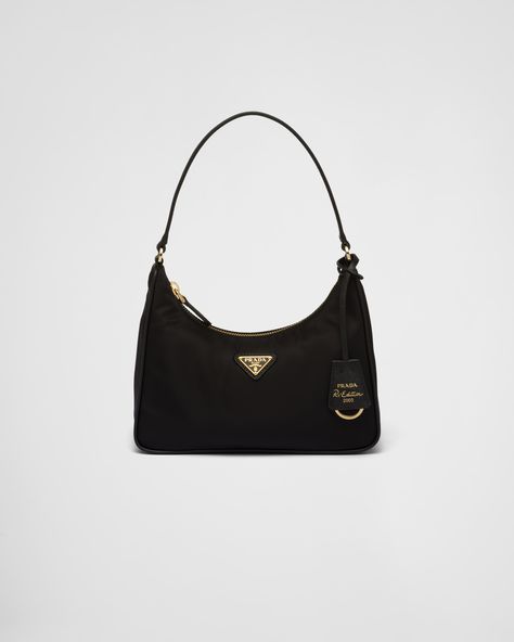 Zipper closure Enameled metal triangle logo Leather handle Re-Nylon logo lining Prada Bag Outfit Street Style, Gold Prada Bag, Prada Small Bag, Prada Nylon Re Edition, Black Designer Bag, Black Prada Bag, Prada Bag Outfit, Prada Hobo, Prada Nylon Bag