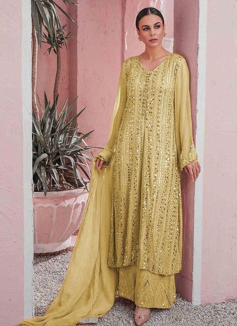 An outstanding aloe veera green faux georgette palazzo style pakistani salwar suit will make you look very stylish and graceful. It has been beautifully designed with embroidered, resham and sequins work. Product Code: 105059 Price INR Rs3,506 Shop @ https://bit.ly/3qaSxBx Yellow Sharara, Cream Beige Color, Salwar Suit Designs, Trouser Suit, Georgette Tops, Palazzo Suit, Palazzo Pant, Beautiful Pakistani Dresses, Eid Dresses