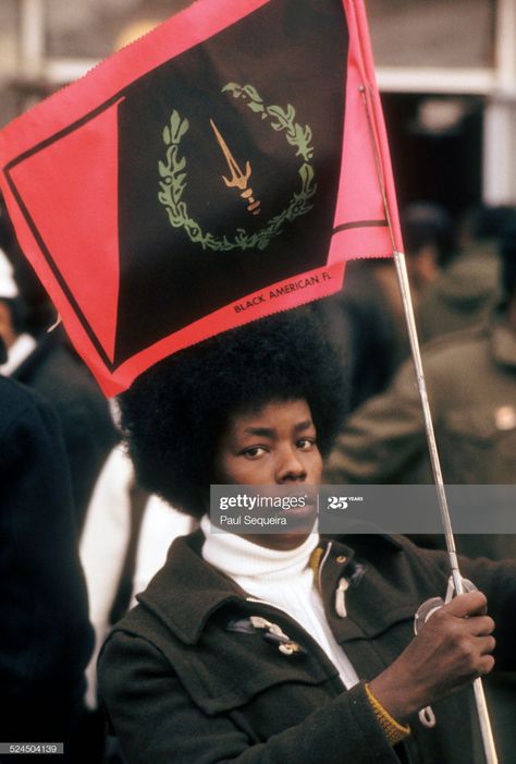 News Photo : Outside the Rayner Funeral Home, a woman holds a... Black American Heritage Flag, American Flag History, Black Panthers Movement, Black American Culture, African American Flag, Fred Hampton, Black American Flag, African American Family, Black Panther Party