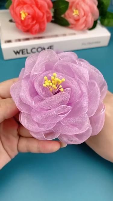 Toddler Craft Time: Fun Activities for Little Explorers Projects Using Ribbon, Art With Ribbons, Flower Present Gift, Flower Made Of Fabric, Tulle Crafts Diy Projects, Silk Flower Tutorial, Silk Ribbon Flowers Diy, Diy Satin Ribbon Flowers, Making Ribbon Flowers