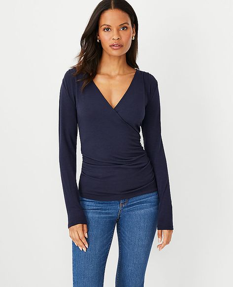 We've upgraded our timeless wrap top with shirred side seams, for a look that's easy yet pulled-together. Crossover V-neck. Long sleeves. Shirred shoulders and side seams.,Hit:Hits at hip,Imported:Imported,Fit:Fitted,Length:23 1/2" long,Fabrication:77% Polyester, 19% Rayon, 4% Spandex,Garment Care:Machine Washable Shirred Wrap Top by Ann Taylor Size - XS Night Sky Women's V, Neck, Wrap, Tops, 77%, Polyester, 19%, Rayon, 4%, Spandex, Machine, Washable Wrap Tops, Knitted Suit, Hip Style, Fall Sweaters, Wrap Top, Night Sky, Effortless Style, Crossover, Sweater Top