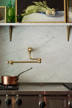 Our Pot Filler tap made in collaboration with Perrin & Rowe is a great little addition to any kitchen. It's perfect placed above a cooker ready to fill pots and pans and anything else really! We fitted it to our Carrara marble splashback it looks so beautiful against this natural stone. #deVOL #PotFillerTap #BrassTaps #CarraraMarble #KitchenGadgets #TraditionalGadgets Brass Pot Filler, Brass Kitchen Tap, Classic English Kitchen, Pot Filler Kitchen, Pot Filler Faucet, Devol Kitchens, Brass Pot, English Kitchens, Pot Filler