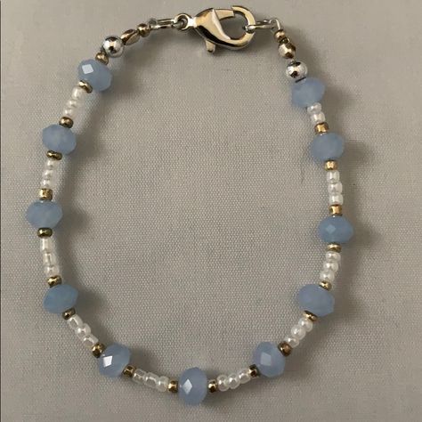 Handmade By Me, A Blue, White And Gold Small Bead Bracelet Accented In Silver. Bracelet Is 6 3/4” Long. Bracelets With Square Beads, Costume Jewelry Bracelets, See Bead Bracelets, Duo Bead Bracelets, Single String Bracelet, Cute Couple Beaded Bracelets, Blue Bracelets Diy, Elegant Beads Bracelet, Blue And Silver Beaded Bracelets