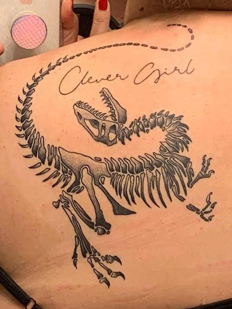 Jurassic park inspired raptor “clever girl” tattoo Prehistoric Tattoo Ideas, Raptor Tattoo Jurassic Park, Small Jurassic Park Tattoos, Jurrasic Park Tattoo Small, Raptor Tattoo Small, Norepinephrine Tattoo, Jurassic Park Tattoo Small, Raptor Dinosaur Tattoo, Clever Girl Tattoo