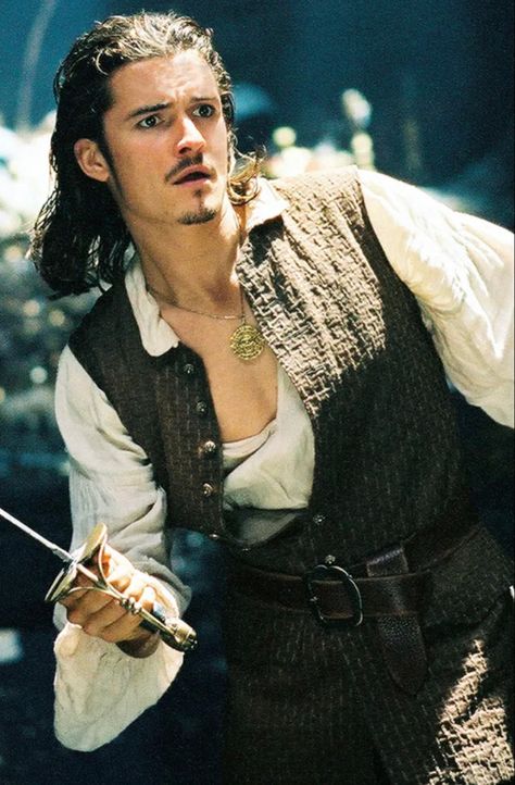 One of the most iconic roles Orlando ever performed was Will Turner in "Pirates of the Caribbean." In the story, Turner is in love with Elizabeth Swann, who is interpreted by Keira Knightley. #piratesofthecaribbean #willturner #orlandobloom Photo for educational purposes only. Keira Knightley, William Turner, Orlando Bloom, Elizabeth Swann, For Educational Purposes Only, Pirate Life, Legolas, Hot Actors, Will Turner