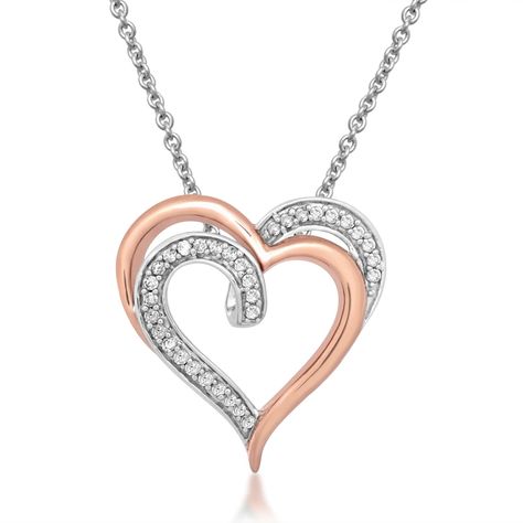 PRICES MAY VARY. Polished heart pendant in 925 sterling silver finished with rose gold and elegantly embellished with 1/10 Cttw white natural diamonds dangled on an 18 inch rolo chain Dimension - L:16.8 MM, W:15.9 MM, H:5.9 MM Packaging & Return – All our Jewelry pieces come with a beautiful jewelry box. 30 days no question asked return policy. Jewelili Promise - All our Diamonds and Gemstones are conflict free and are finely crafted in high-quality materials. With an unparalleled dedication to Heart Pendent, Diamond Heart Pendant Necklace, Heart Shaped Pendant Necklace, Double Heart Necklace, Heart Shaped Jewelry, Heart Necklace Diamond, Diamond Jewelry Necklace, Heart Pendant Diamond, Heart Shaped Diamond