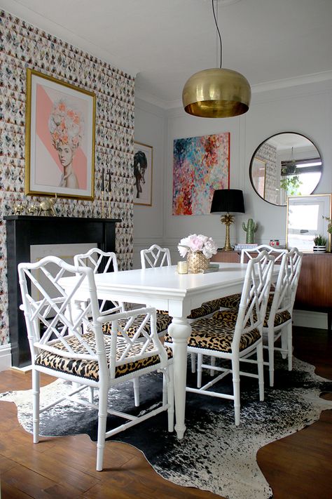 Eclectic glam living room with graphic feature wallpaper, leopard print chairs, black and marble fireplace, gold light fixture - see more on www.swoonworthy.co.uk Boho Glam Dining Room, Eclectic Glam Living Room, Gold Wallpaper Living Room, Eclectic Living Room Design, Glam Dining Room, Glam Dining, Gold Dining Room, Eclectic Chairs, Eclectic Contemporary