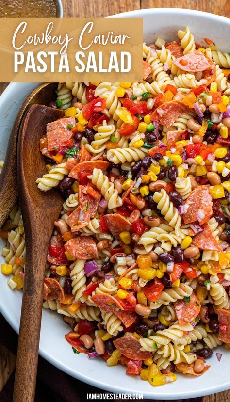 A large bowl of cowboy caviar pasta with a wooden serving spoon in the bowl. Cowboy Caviar Pasta, Summer Pasta Salad Recipes Cold, Caviar Pasta, Italian Vinaigrette, Summer Pasta Salad Recipes, The Perfect Salad, Cold Pasta Salad Recipes, Perfect Salad, Cowboy Caviar