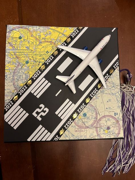 So fun to make, and perfect for a pilot graduating college #pilot #pilotgraduation #aviation #graduation Plane Graduation Cap, Flight School Graduation, Graduation Cap Designs Pilot, Pilot Themed Party, Aerospace Engineering Graduation Cap, Airplane Graduation Cap, Aerospace Graduation Cap, Pilot Graduation Cap, Aviation Graduation Cap