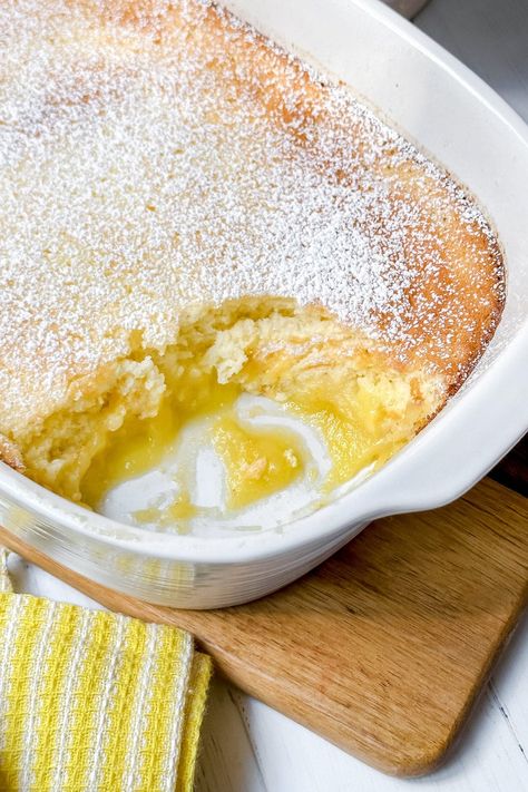 Baked Lemon Pudding is a delicious, irresistibly light and airy dessert with Irish origins. A sweet, effortless treat you don't want to miss. Pie, Irish Lemon Pudding, Lemon Cake Pudding, Dessert With Lots Of Eggs, Lemon Delicious Pudding Dessert Recipes, Lemon Delicious Pudding, Warm Pudding Recipes, Lemon Deserts Ideas, Baked Lemon Pudding